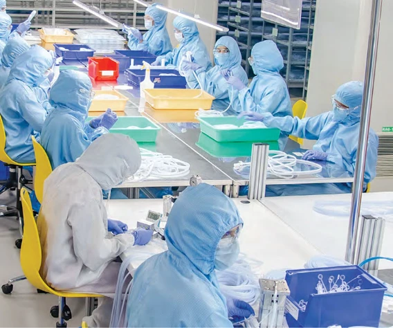 workers at assembly unit