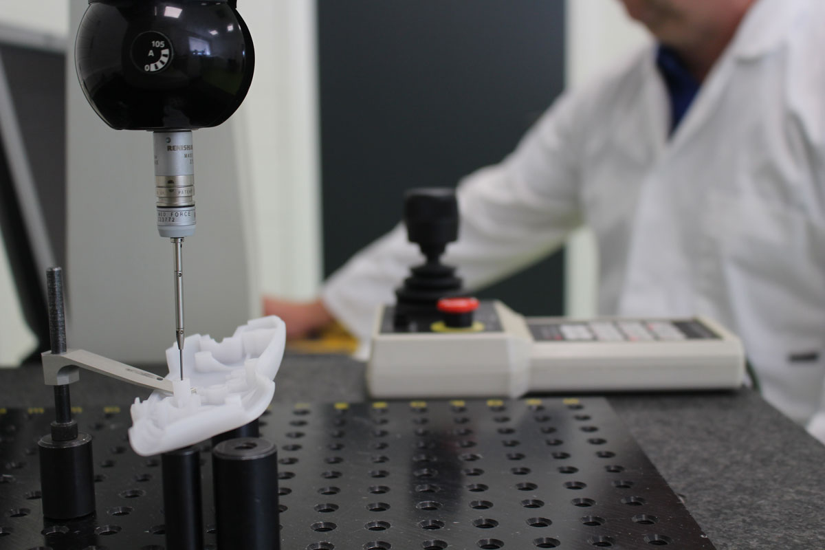 Employee Working in Molded Medical Device Parts
